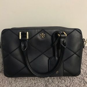 Black leather Tory Burch leather tote with slipcover, almost no signs of wear
